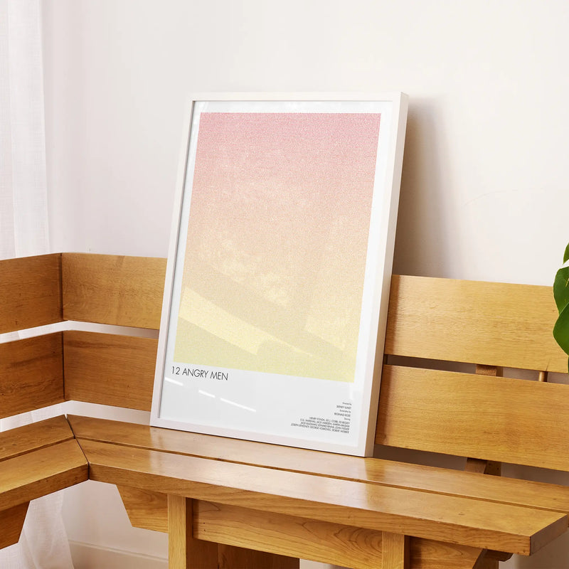 A framed 12 Angry Men movie script poster displayed on a sideboard in a contemporary space.