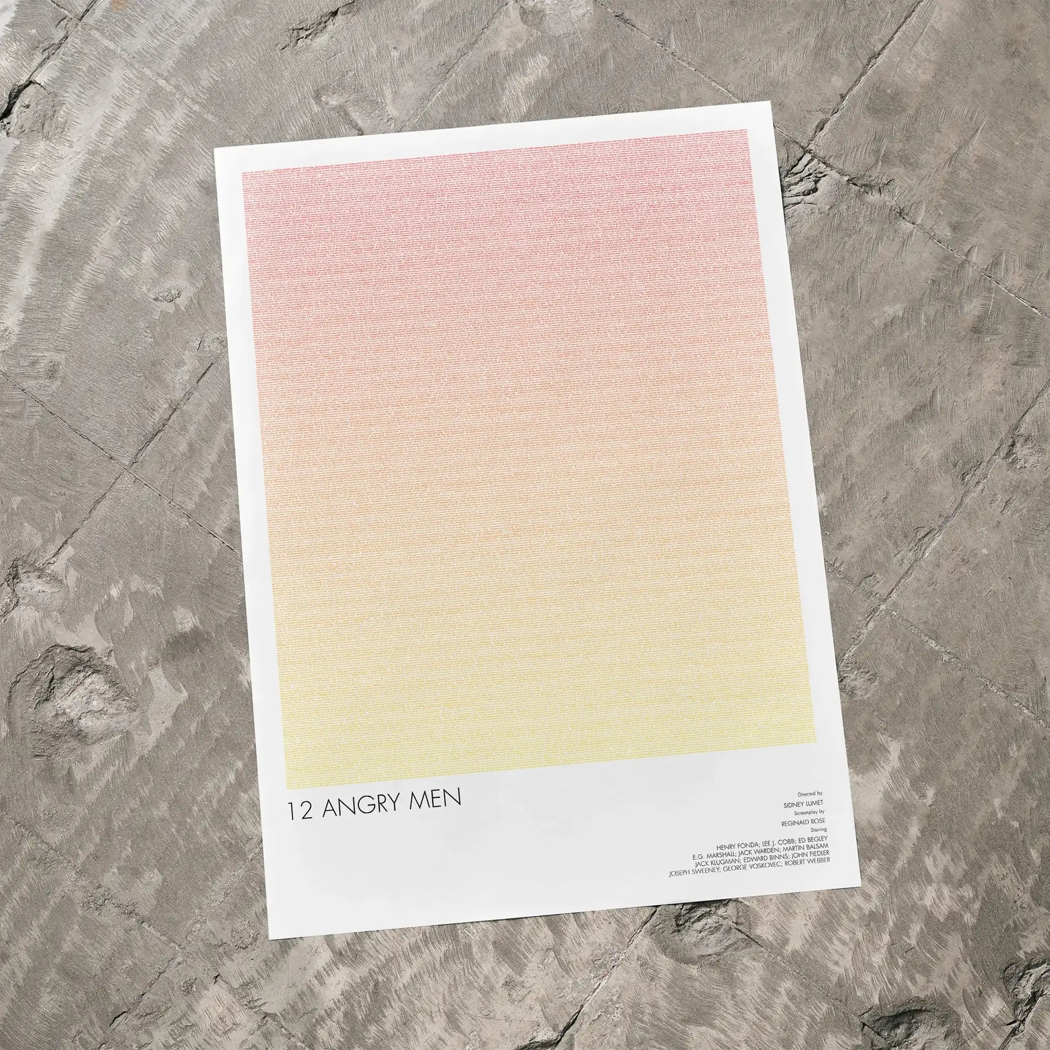 A 12 Angry Men movie script poster laid flat on a textured floor surface.