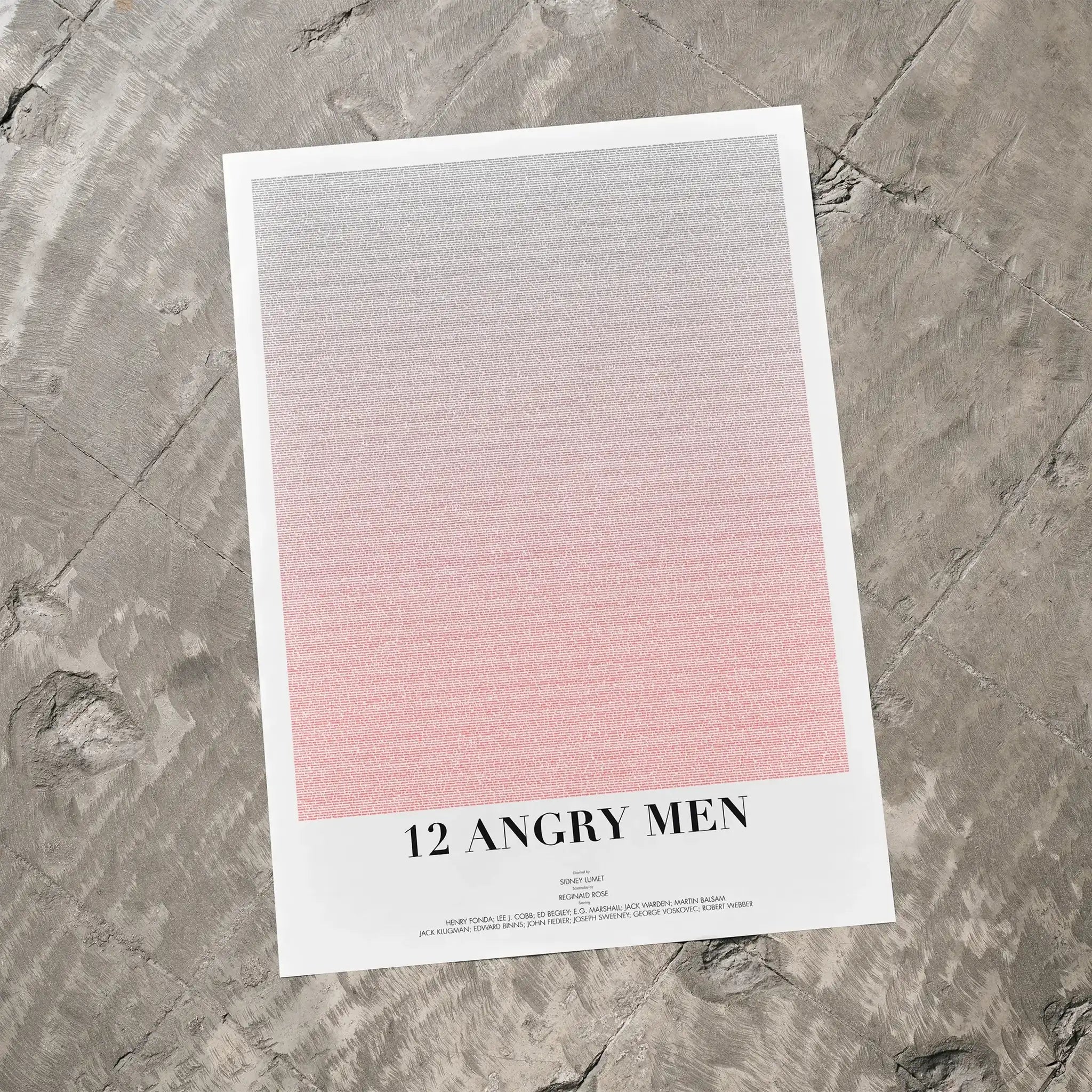 A 12 Angry Men movie script poster laid flat on a textured floor surface.