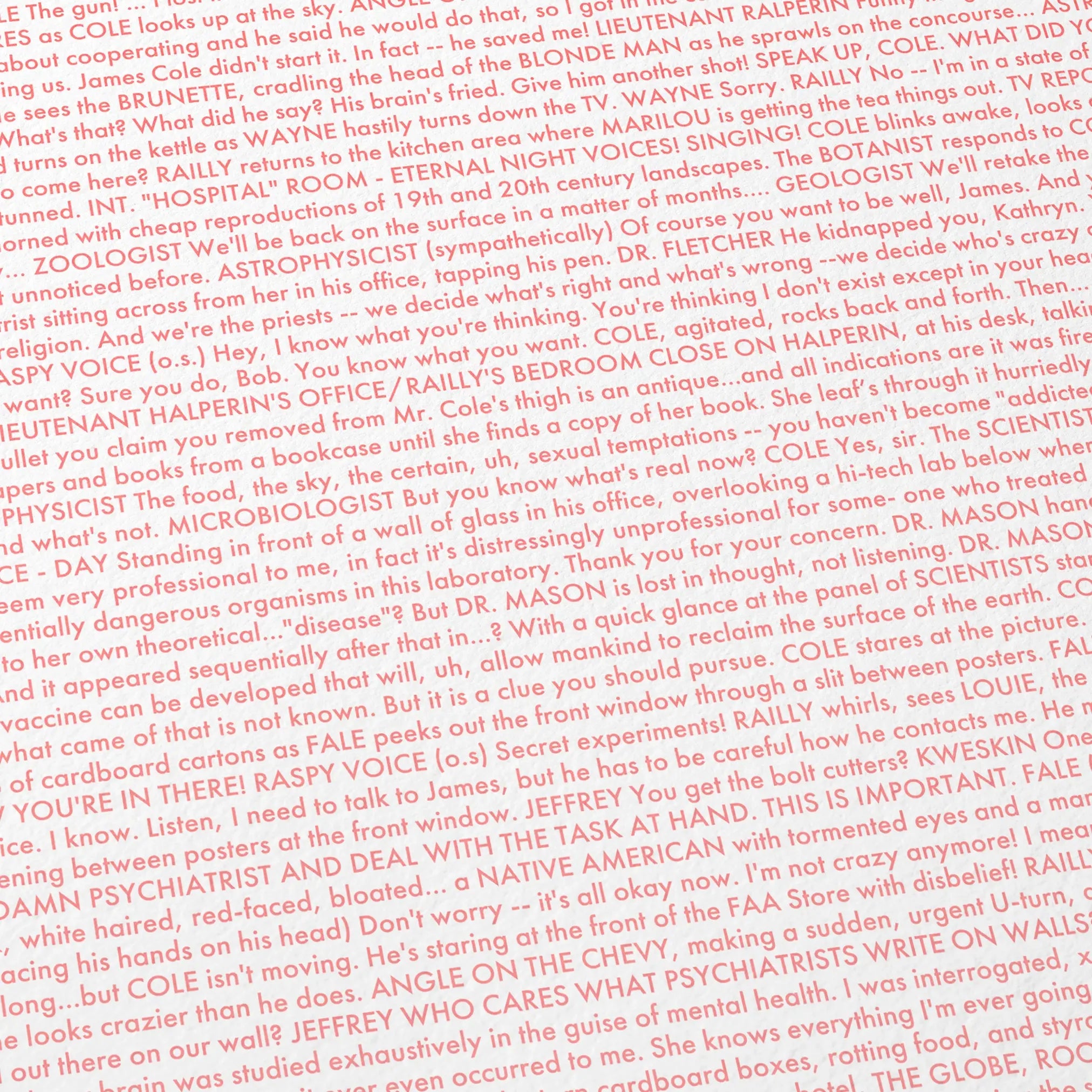Close-up detail of the 12 Monkeys movie script poster showing dense typographic text.