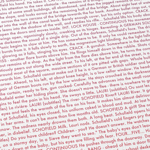 Close-up detail of the 1917 movie script poster showing dense typographic text.