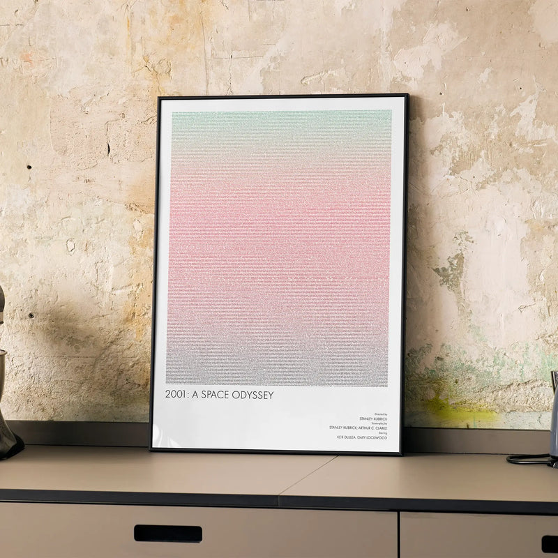 A framed 2001: A Space Odyssey movie script poster displayed on a cabinet in a minimalist interior.