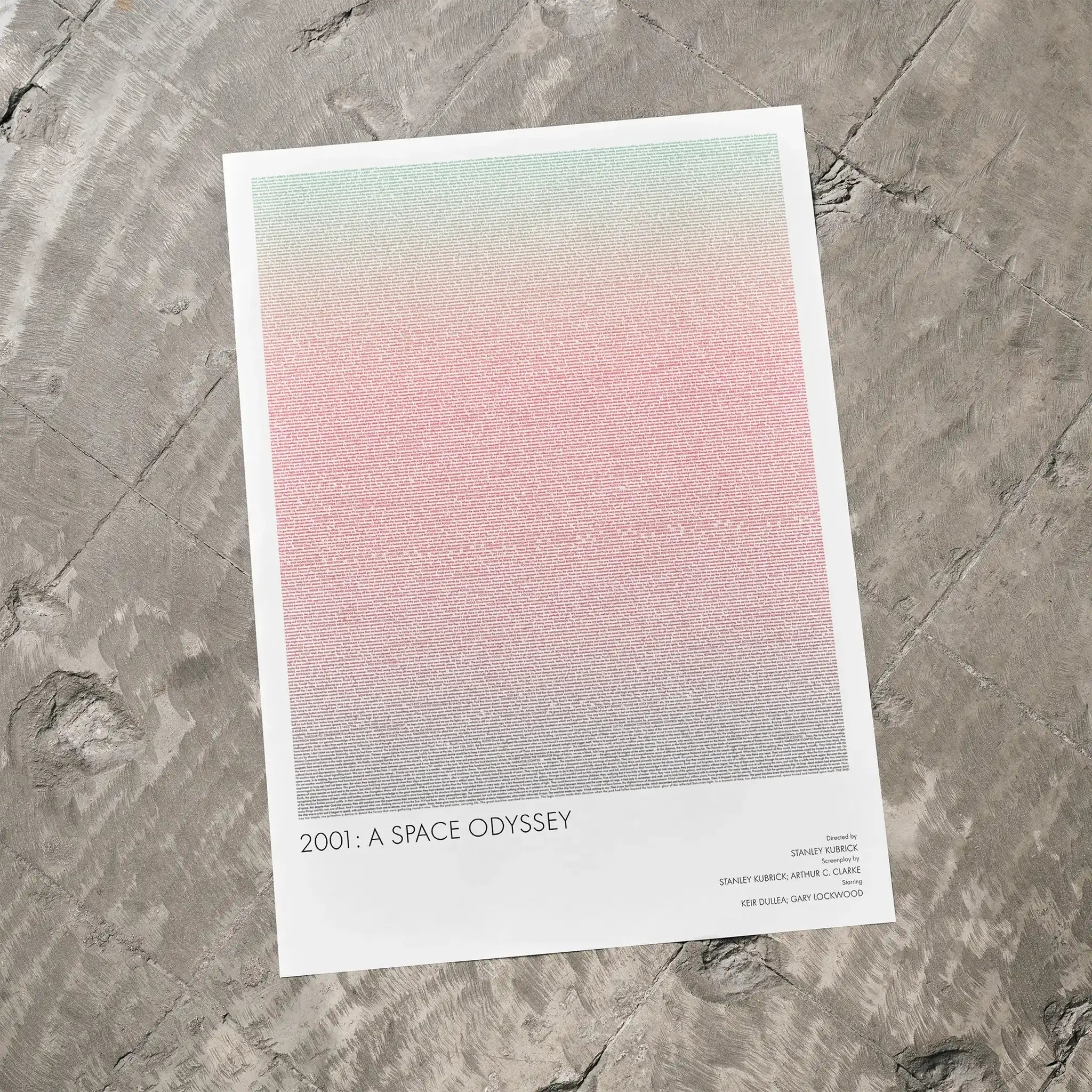 A 2001: A Space Odyssey movie script poster laid flat on a textured floor surface.