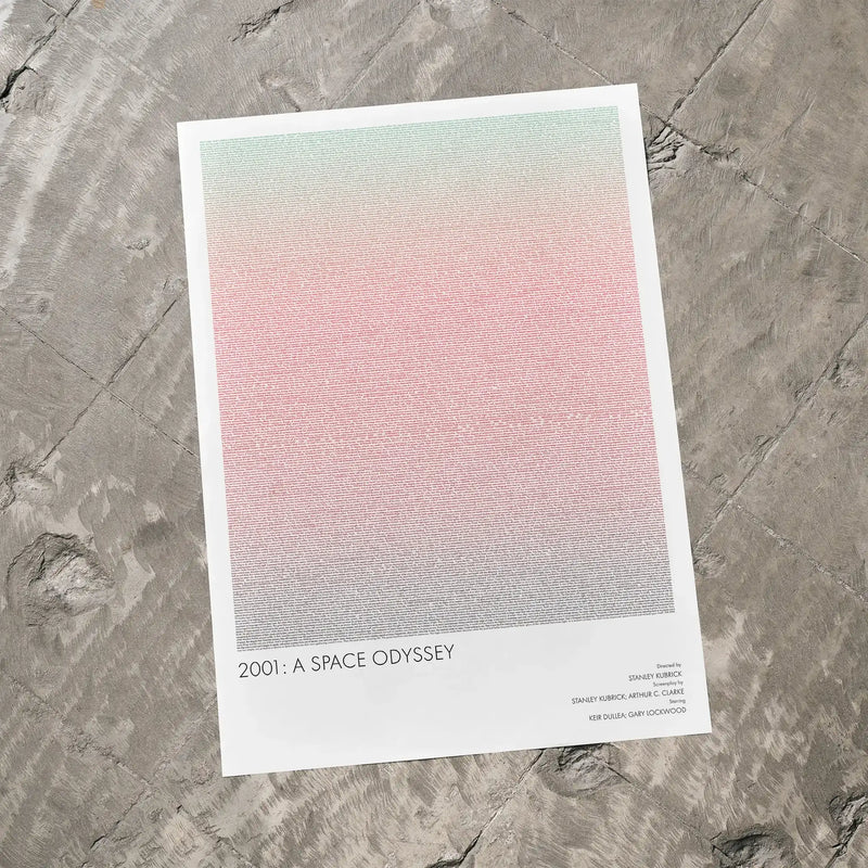 A 2001: A Space Odyssey movie script poster laid flat on a textured floor surface.