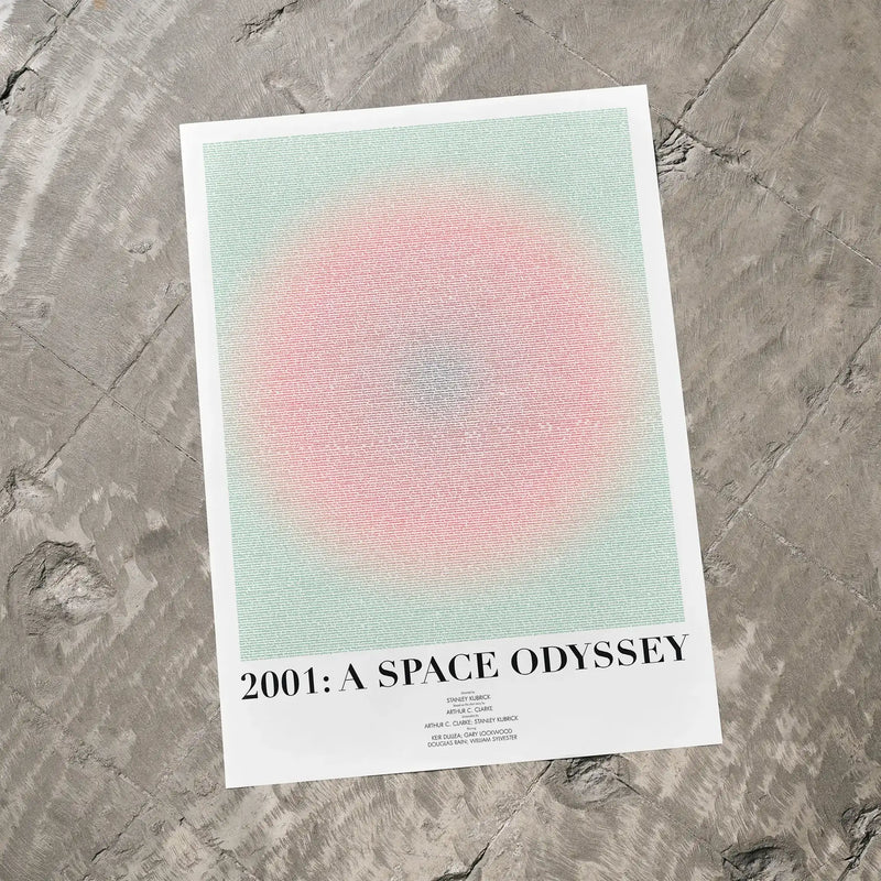 A 2001: A Space Odyssey movie script poster laid flat on a textured floor surface.
