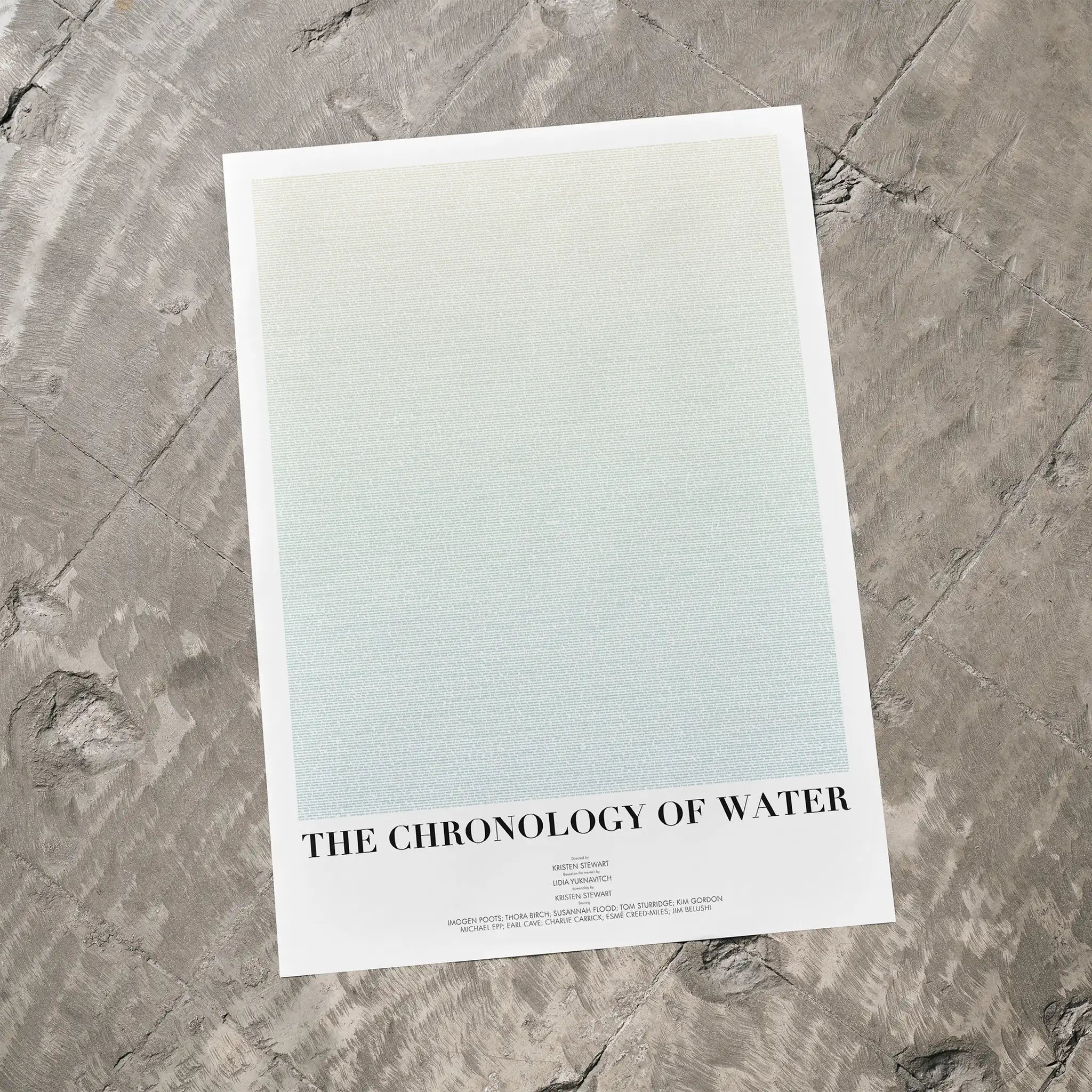 Poster titled 'The Chronology of Water' on a textured gray surface