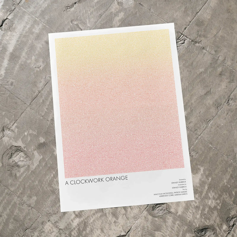 A A Clockwork Orange movie script poster laid flat on a textured floor surface.