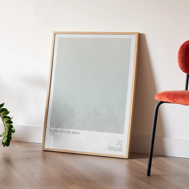 A framed A Few Good Men movie script poster placed in a bright interior environment.