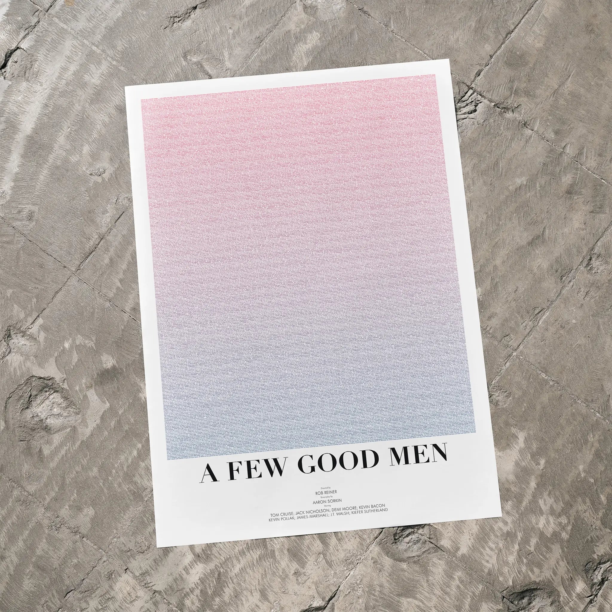 A A Few Good Men movie script poster laid flat on a textured floor surface.