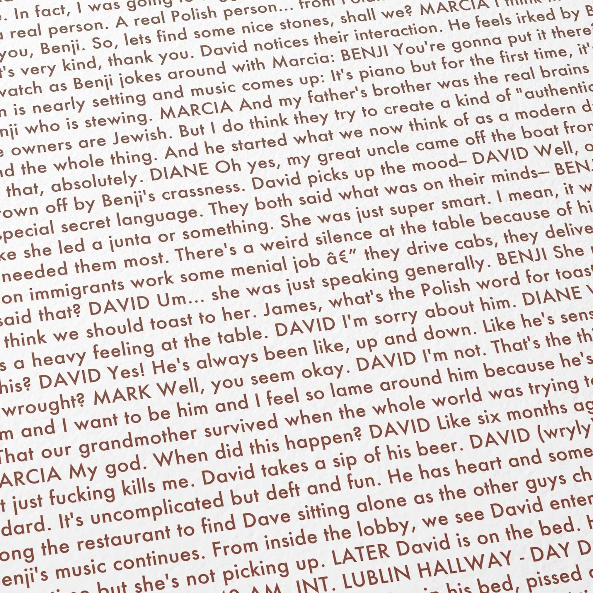 Close-up detail of the A Real Pain movie script poster showing dense typographic text.