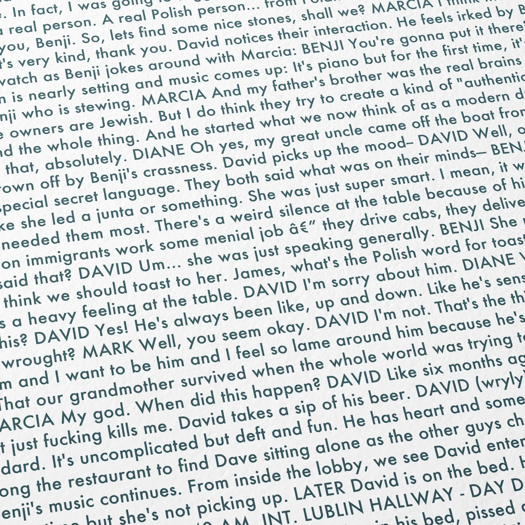 Close-up detail of the A Real Pain movie script poster showing dense typographic text.