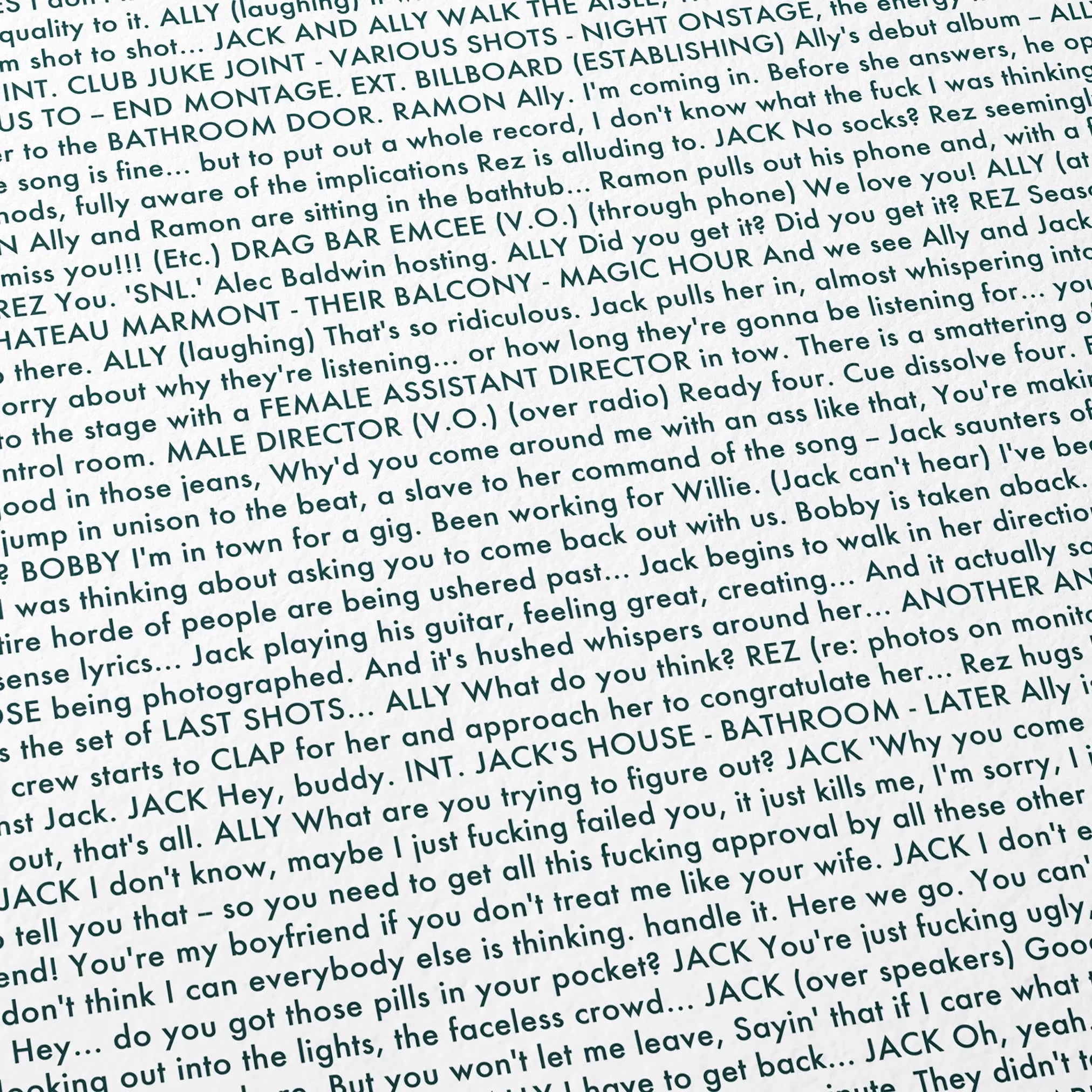 Close-up detail of the A Star is Born movie script poster showing dense typographic text.