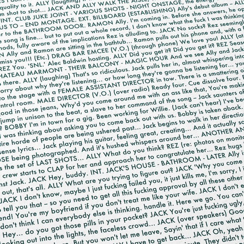 Close-up detail of the A Star is Born movie script poster showing dense typographic text.