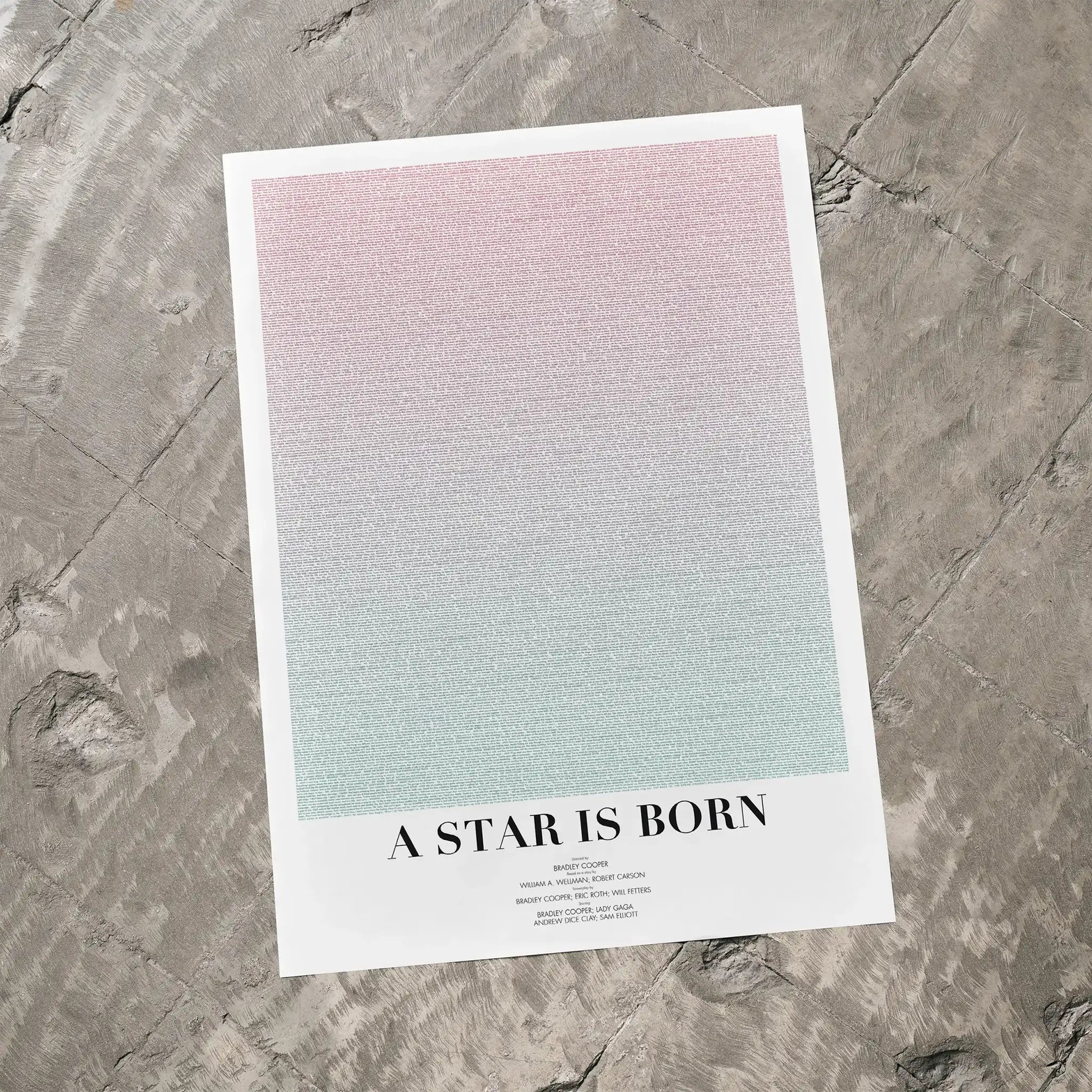 A A Star is Born movie script poster laid flat on a textured floor surface.