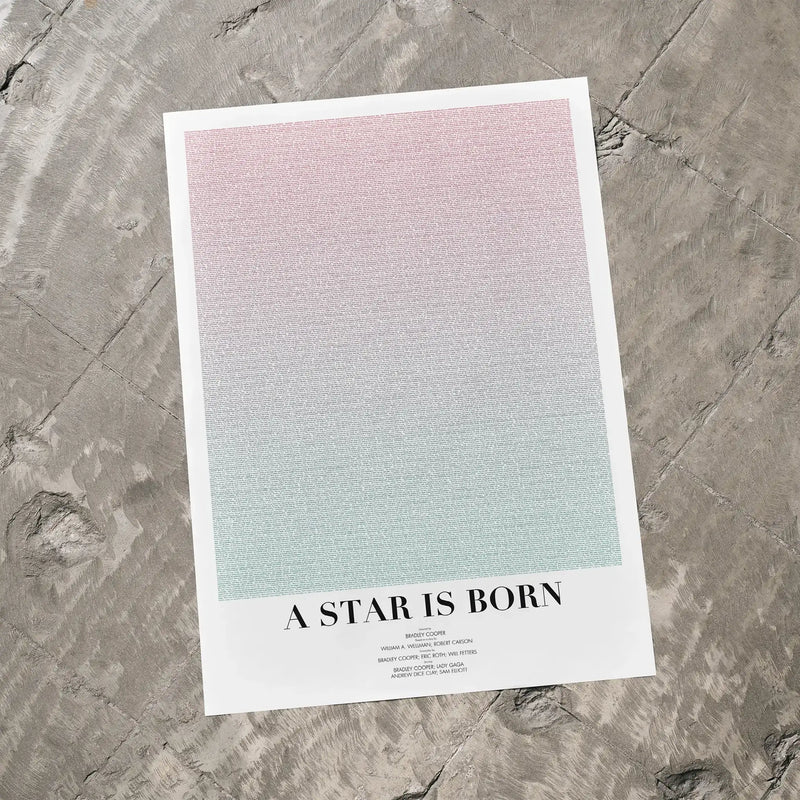 A A Star is Born movie script poster laid flat on a textured floor surface.