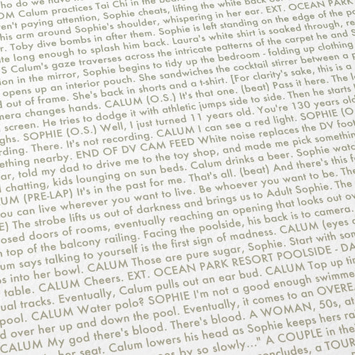 Close-up detail of the Aftersun movie script poster showing dense typographic text.