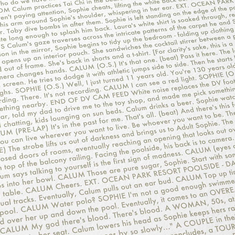 Close-up detail of the Aftersun movie script poster showing dense typographic text.