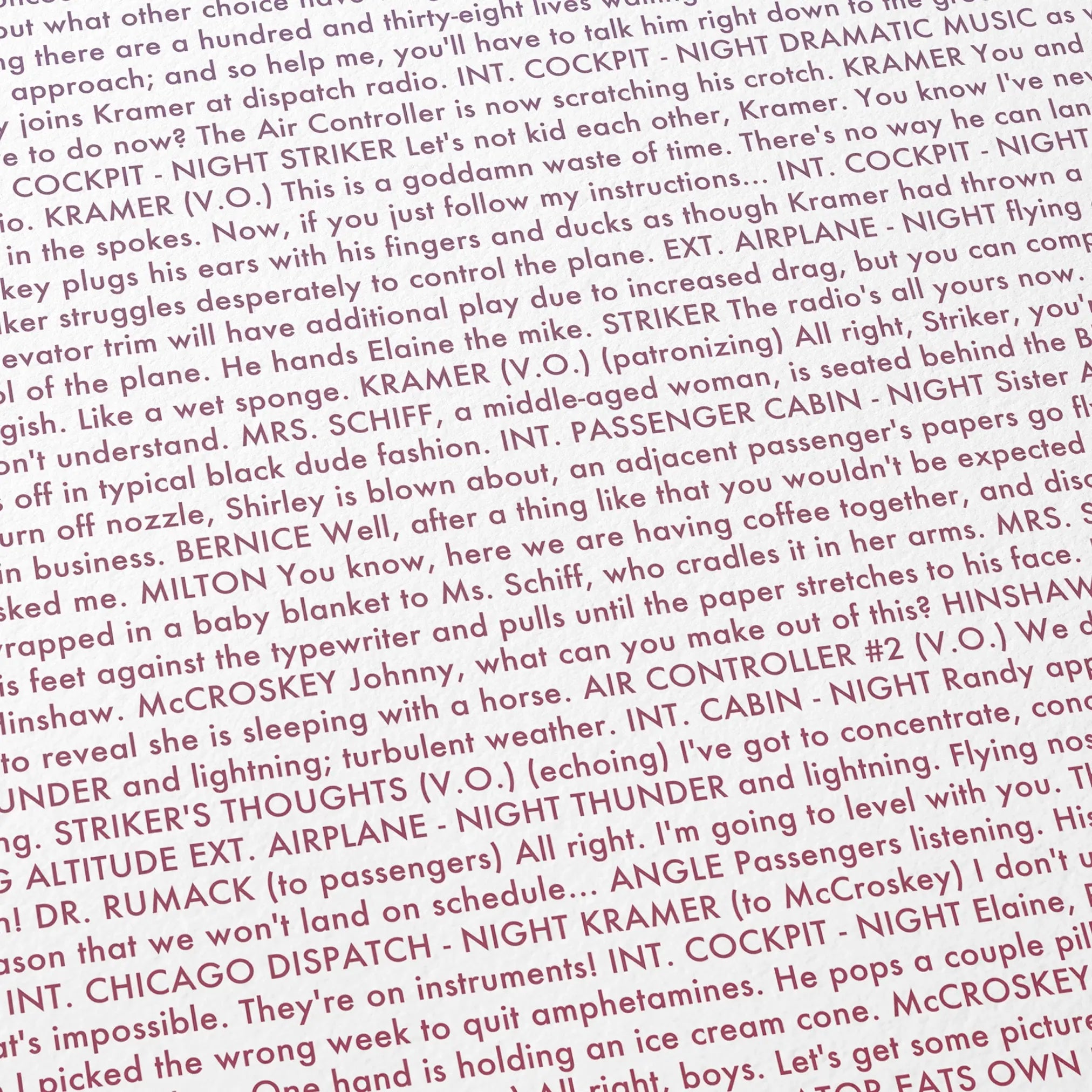 Close-up detail of the Airplane movie script poster showing dense typographic text.