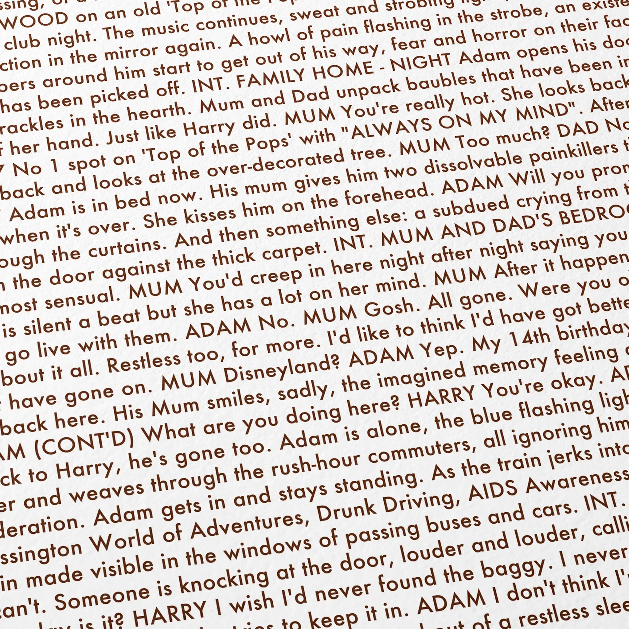 Close-up detail of the All of Us Strangers movie script poster showing dense typographic text.