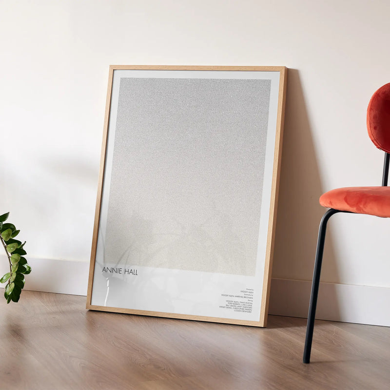 A framed Annie Hall movie script poster placed in a bright interior environment.