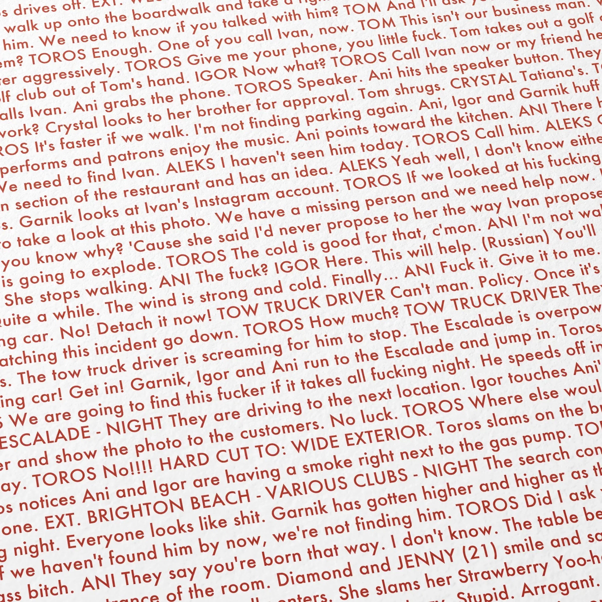 Close-up detail of the Anora movie script poster showing dense typographic text.