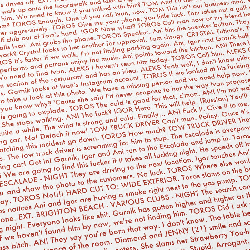 Close-up detail of the Anora movie script poster showing dense typographic text.