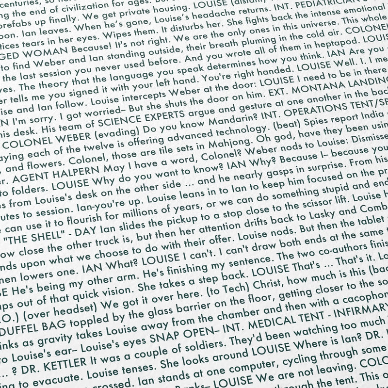Close-up detail of the Arrival movie script poster showing dense typographic text.