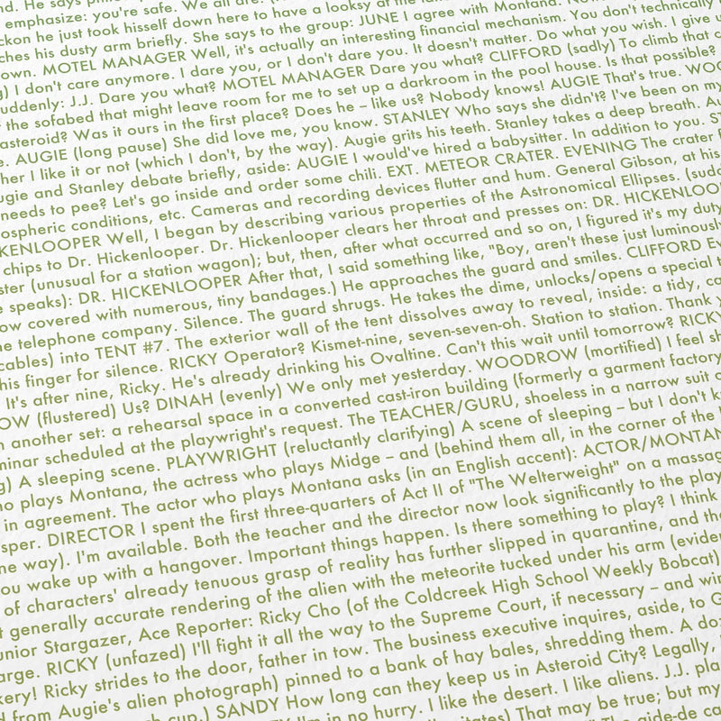 Close-up detail of the Asteroid City movie script poster showing dense typographic text.