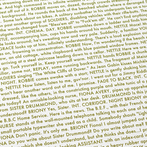 Close-up detail of the Atonement movie script poster showing dense typographic text.