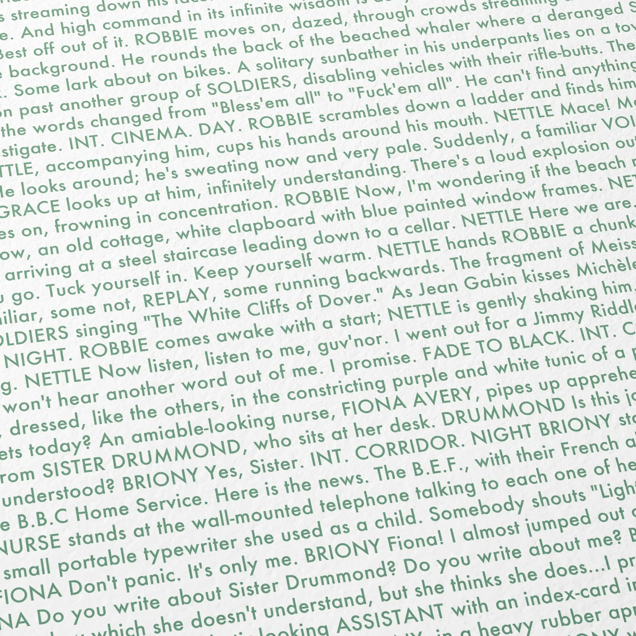 Close-up detail of the Atonement movie script poster showing dense typographic text.