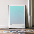 A framed Avatar movie script poster leaning against a wall in a minimalist interior.