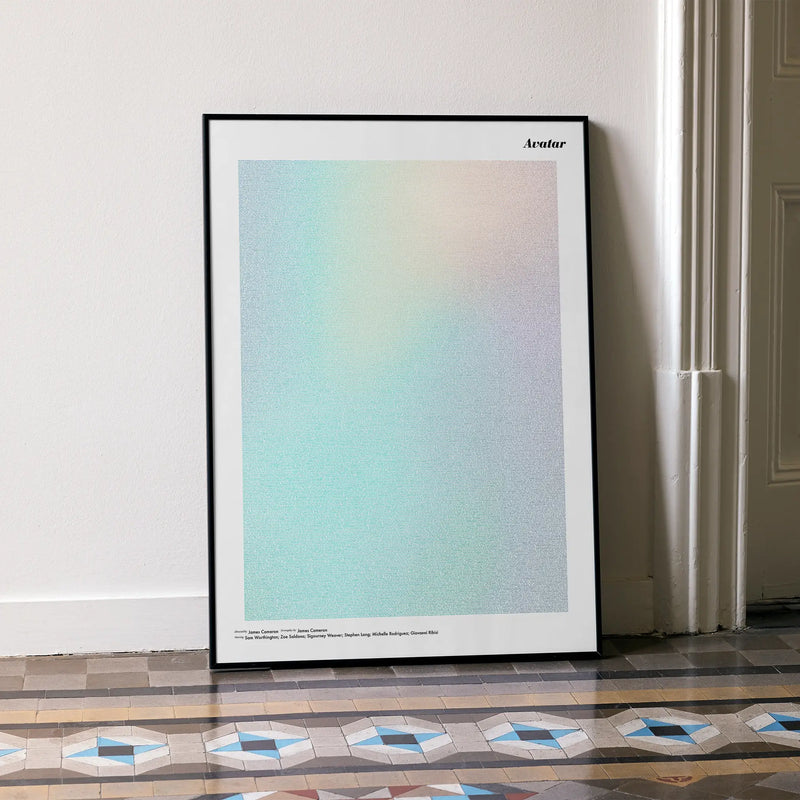 A framed Avatar movie script poster leaning against a wall in a minimalist interior.