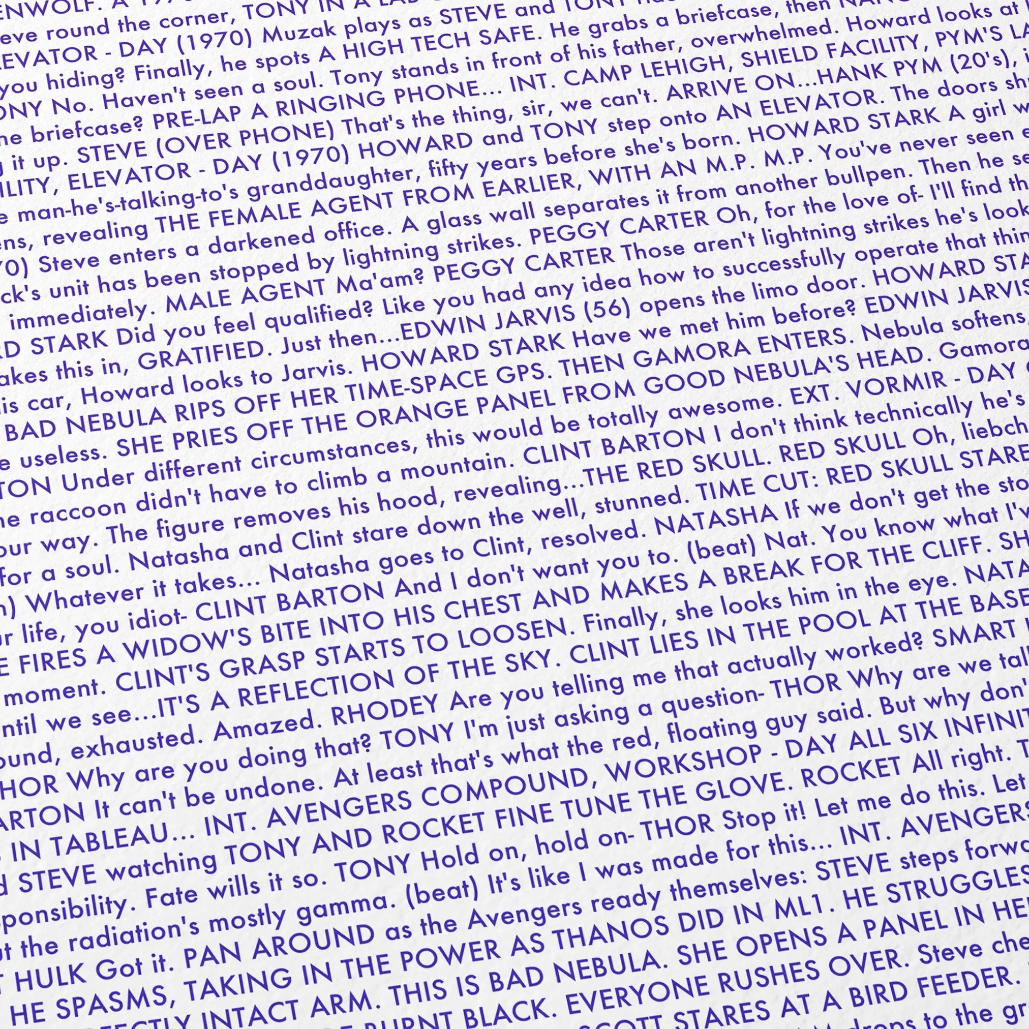 Close-up detail of the Avengers: Endgame movie script poster showing dense typographic text.