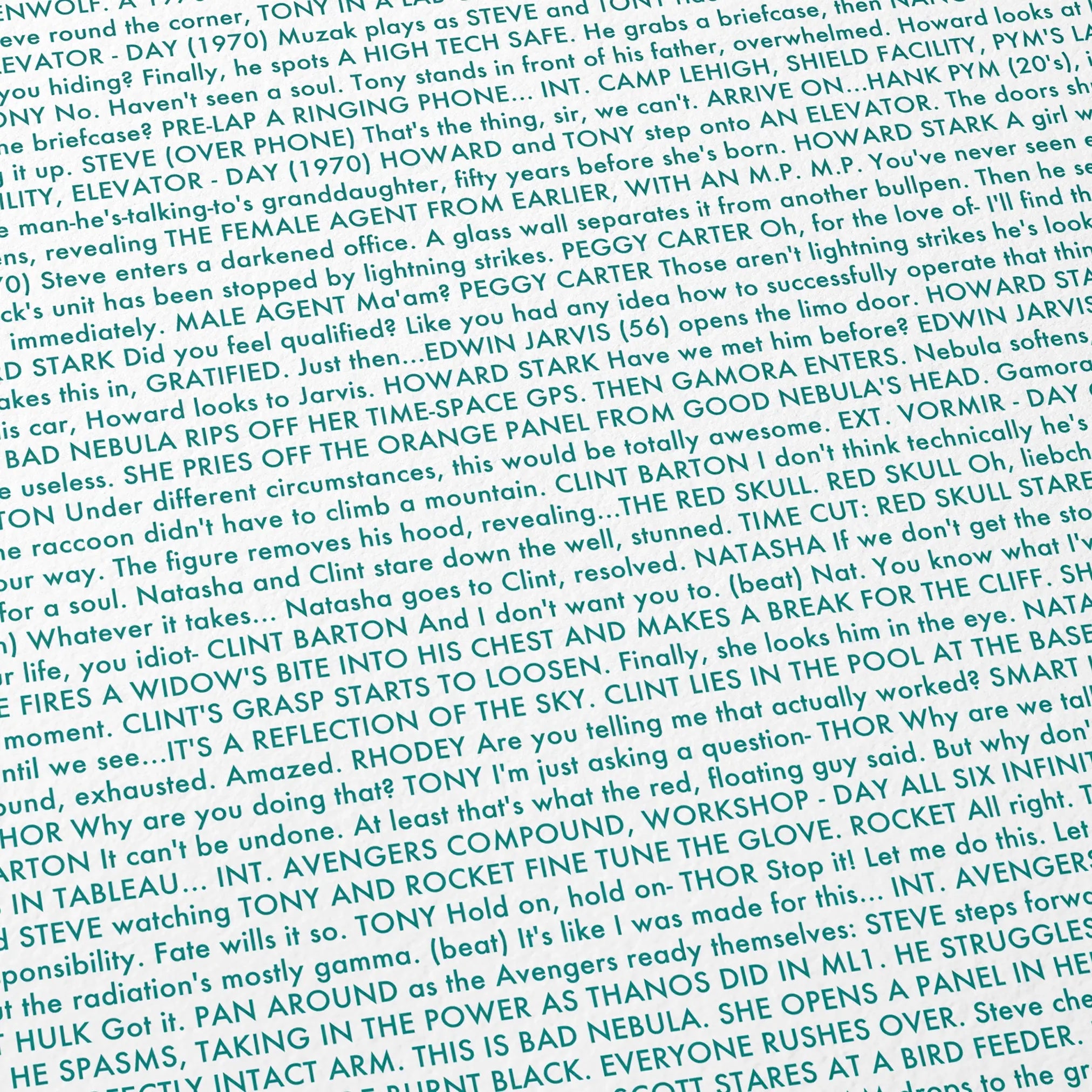 Close-up detail of the Avengers: Endgame movie script poster showing dense typographic text.