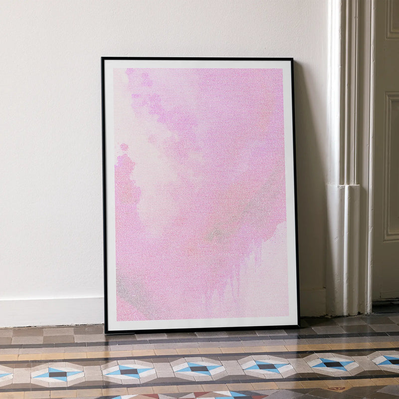 A framed Barbie movie script poster leaning against a wall in a minimalist interior.