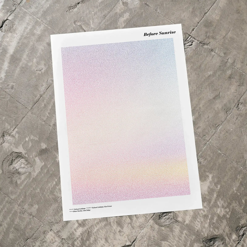 A Before Sunrise movie script poster laid flat on a textured floor surface.