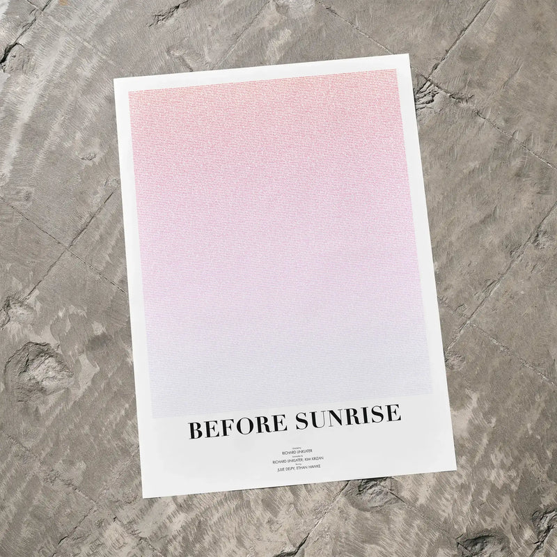A Before Sunrise movie script poster laid flat on a textured floor surface.