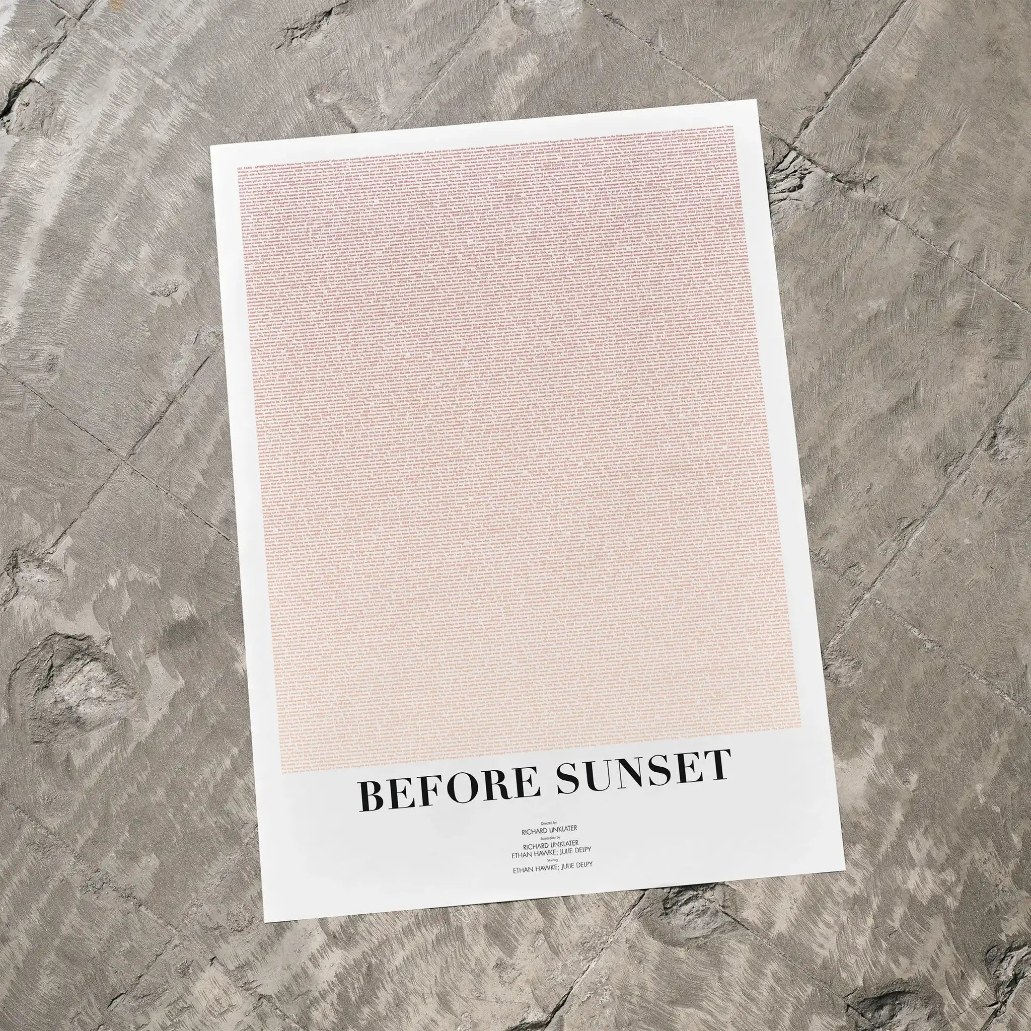 A Before Sunset movie script poster laid flat on a textured floor surface.