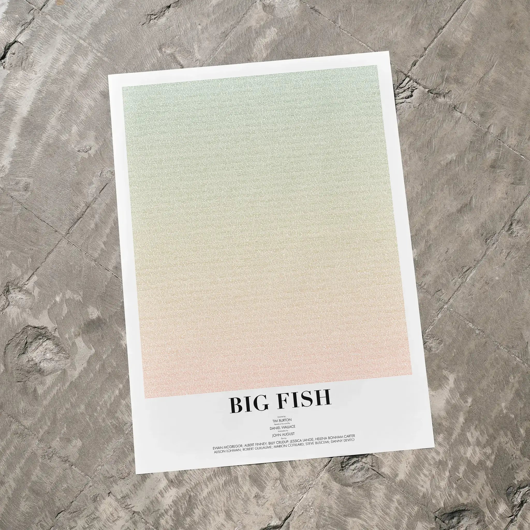 A Big Fish movie script poster laid flat on a textured floor surface.
