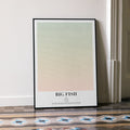 A framed Big Fish movie script poster leaning against a wall in a minimalist interior.