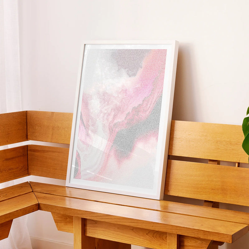 A framed Black Swan movie script poster displayed on a sideboard in a contemporary space.