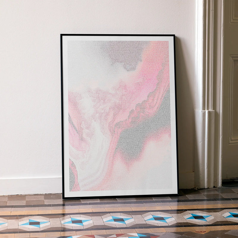 A framed Black Swan movie script poster leaning against a wall in a minimalist interior.