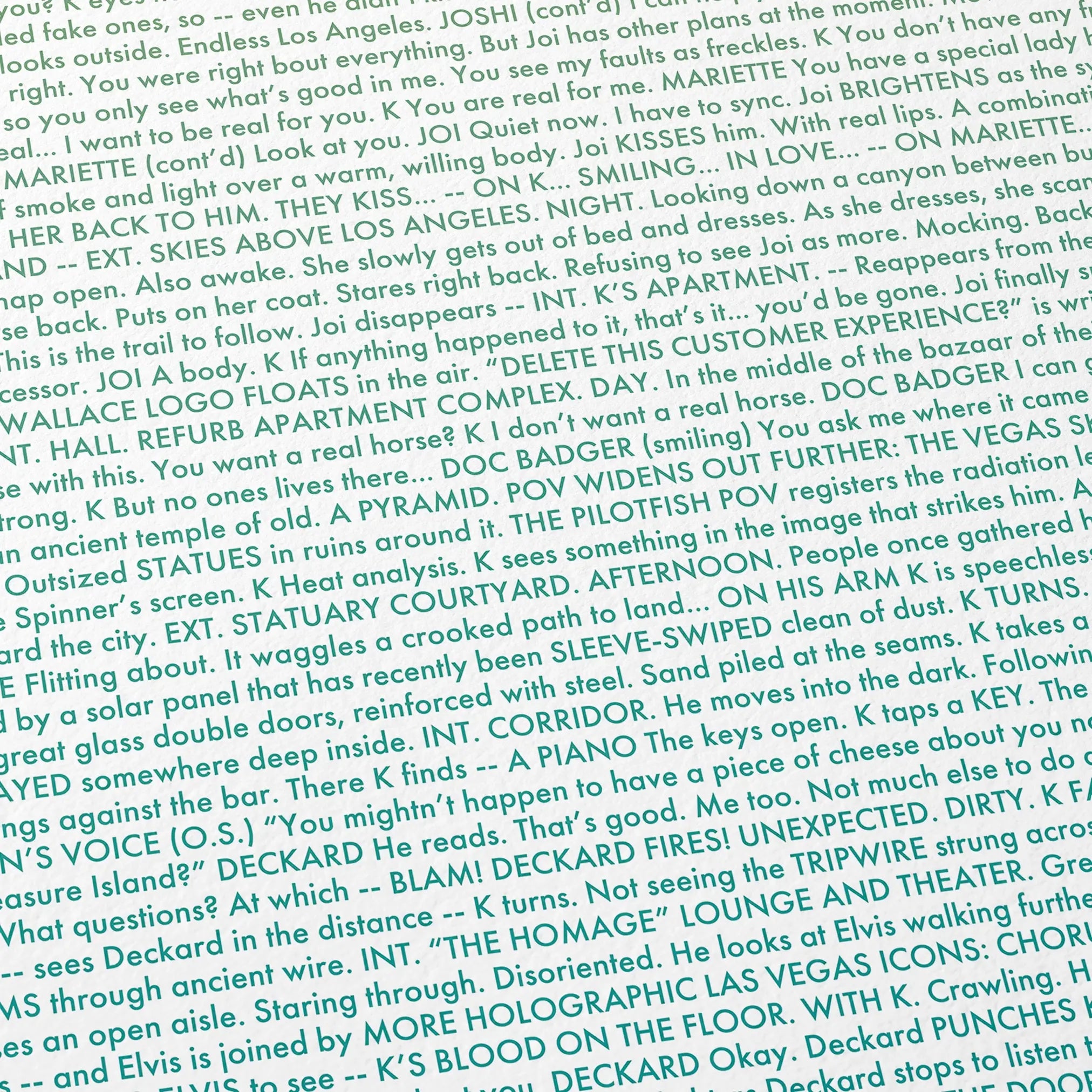 Close-up detail of the Blade Runner 2049 movie script poster showing dense typographic text.