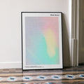 A framed Blade Runner movie script poster leaning against a wall in a minimalist interior.