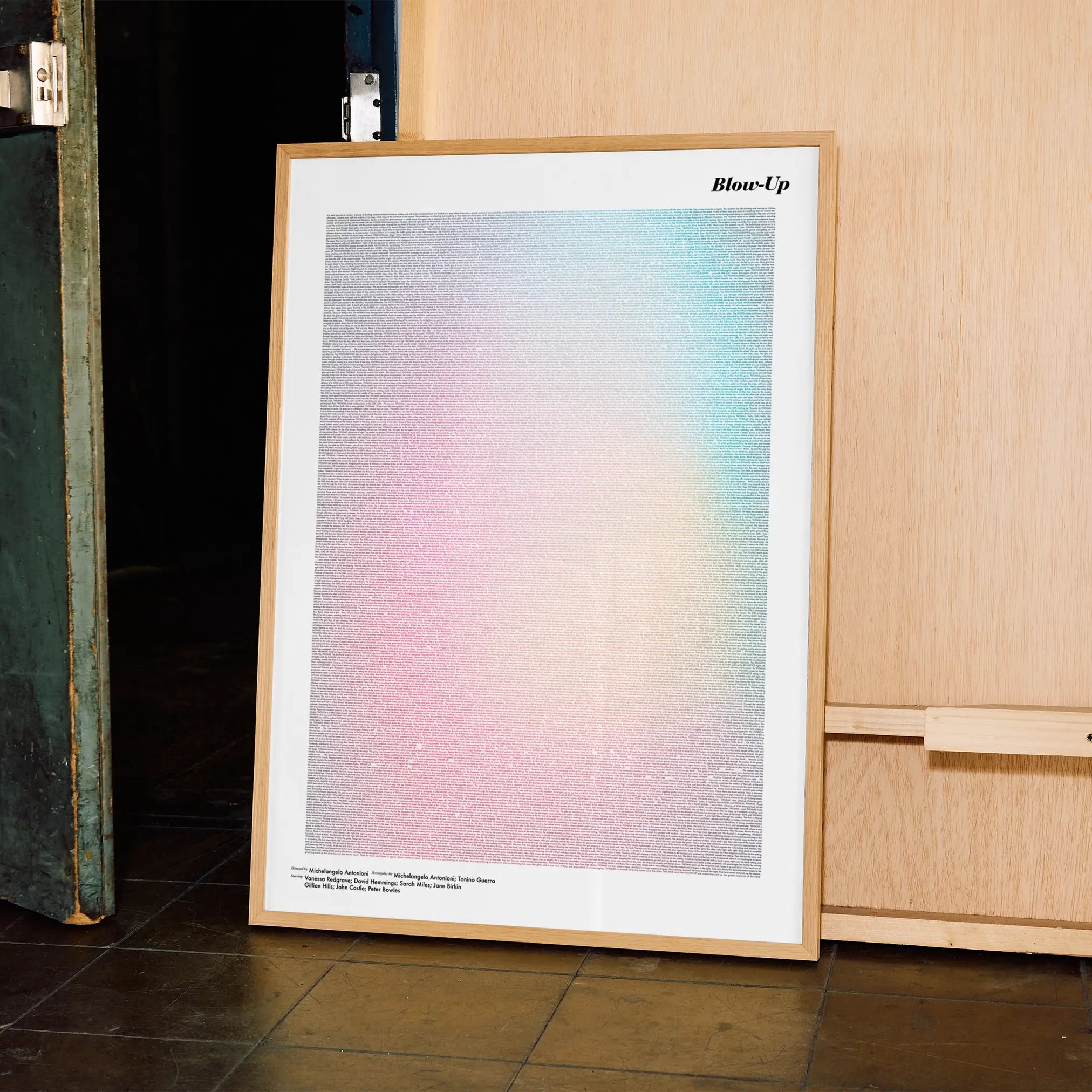 A framed Blow-Up movie script poster displayed in a contemporary interior setting.