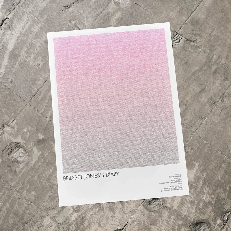 A Bridget Jones's Diary movie script poster laid flat on a textured floor surface.