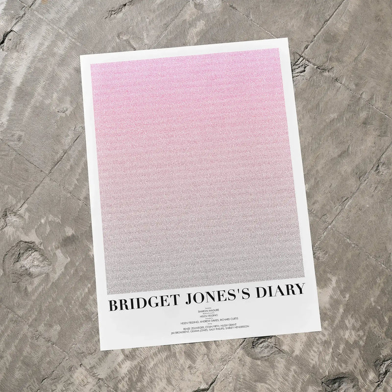 A Bridget Jones's Diary movie script poster laid flat on a textured floor surface.