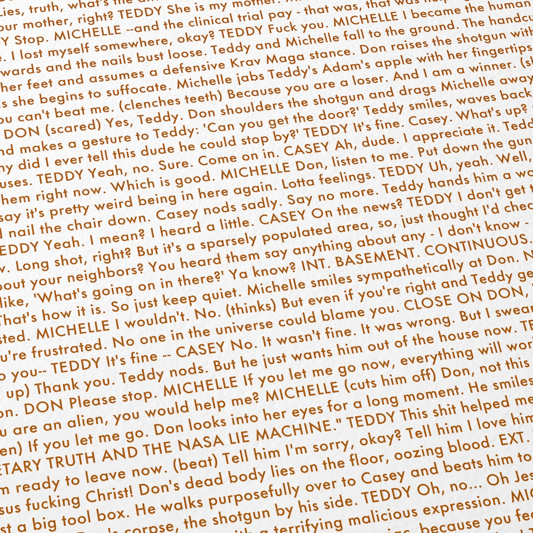 Close-up detail of the Bugonia movie script poster showing dense typographic text.