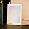 A framed Bullitt movie script poster displayed in a contemporary interior setting.