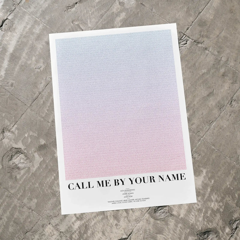 A Call Me by Your Name movie script poster laid flat on a textured floor surface.